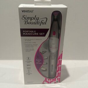 VIVITAR Simply Beautiful Portable Manicure Set with 5 attachment heads.